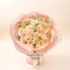 Bó hoa sinh nhật tone cam hồng pastel nhẹ nhàng từ shop hoa sinh nhật gần đây.