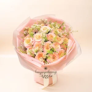 Bó hoa sinh nhật tone cam hồng pastel nhẹ nhàng từ shop hoa sinh nhật gần đây.