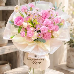 Bó hoa tươi cao cấp tone hồng pastel sang trọng tại shop hoa tươi cao cấp Hoa Gửi Yêu Thương – lựa chọn lý tưởng cho ngày đặc biệt.