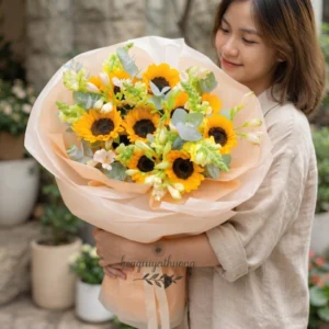 Bó hoa hướng dương sang trọng làm quà tặng tại tiệm hoa gần đây mở cửa 24/7.